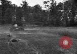 Image of tractor-drawn binder United States USA, 1919, second 23 stock footage video 65675070232