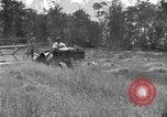Image of tractor-drawn binder United States USA, 1919, second 28 stock footage video 65675070232
