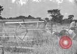 Image of tractor-drawn binder United States USA, 1919, second 32 stock footage video 65675070232
