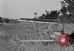 Image of tractor-drawn binder United States USA, 1919, second 62 stock footage video 65675070232