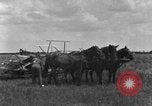 Image of horse-drawn binder United States USA, 1919, second 30 stock footage video 65675070233