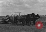 Image of horse-drawn binder United States USA, 1919, second 34 stock footage video 65675070233
