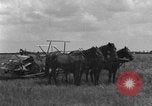 Image of horse-drawn binder United States USA, 1919, second 35 stock footage video 65675070233