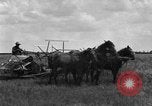 Image of horse-drawn binder United States USA, 1919, second 46 stock footage video 65675070233