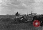 Image of horse-drawn binder United States USA, 1919, second 54 stock footage video 65675070233