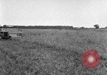 Image of Fordson tractor operating in a field United States USA, 1919, second 3 stock footage video 65675070234