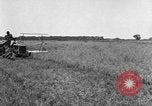 Image of Fordson tractor operating in a field United States USA, 1919, second 6 stock footage video 65675070234