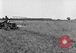 Image of Fordson tractor operating in a field United States USA, 1919, second 7 stock footage video 65675070234