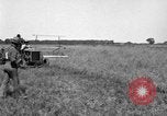 Image of Fordson tractor operating in a field United States USA, 1919, second 8 stock footage video 65675070234