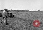 Image of Fordson tractor operating in a field United States USA, 1919, second 9 stock footage video 65675070234