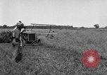 Image of Fordson tractor operating in a field United States USA, 1919, second 10 stock footage video 65675070234