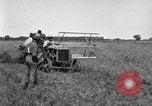 Image of Fordson tractor operating in a field United States USA, 1919, second 12 stock footage video 65675070234