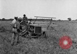 Image of Fordson tractor operating in a field United States USA, 1919, second 13 stock footage video 65675070234