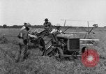 Image of Fordson tractor operating in a field United States USA, 1919, second 15 stock footage video 65675070234