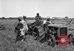 Image of Fordson tractor operating in a field United States USA, 1919, second 17 stock footage video 65675070234