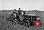 Image of Fordson tractor operating in a field United States USA, 1919, second 18 stock footage video 65675070234