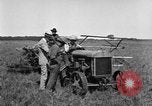 Image of Fordson tractor operating in a field United States USA, 1919, second 19 stock footage video 65675070234