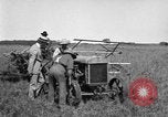 Image of Fordson tractor operating in a field United States USA, 1919, second 20 stock footage video 65675070234