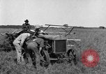 Image of Fordson tractor operating in a field United States USA, 1919, second 22 stock footage video 65675070234
