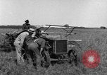 Image of Fordson tractor operating in a field United States USA, 1919, second 23 stock footage video 65675070234