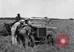 Image of Fordson tractor operating in a field United States USA, 1919, second 24 stock footage video 65675070234
