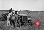 Image of Fordson tractor operating in a field United States USA, 1919, second 25 stock footage video 65675070234