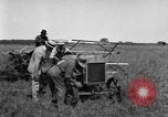 Image of Fordson tractor operating in a field United States USA, 1919, second 27 stock footage video 65675070234