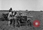 Image of Fordson tractor operating in a field United States USA, 1919, second 28 stock footage video 65675070234