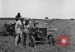 Image of Fordson tractor operating in a field United States USA, 1919, second 29 stock footage video 65675070234