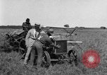 Image of Fordson tractor operating in a field United States USA, 1919, second 30 stock footage video 65675070234