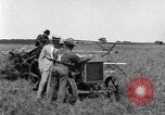 Image of Fordson tractor operating in a field United States USA, 1919, second 31 stock footage video 65675070234