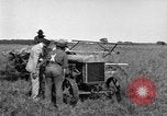 Image of Fordson tractor operating in a field United States USA, 1919, second 33 stock footage video 65675070234