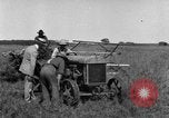 Image of Fordson tractor operating in a field United States USA, 1919, second 34 stock footage video 65675070234