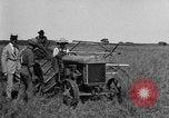 Image of Fordson tractor operating in a field United States USA, 1919, second 37 stock footage video 65675070234