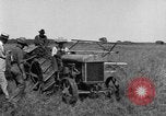 Image of Fordson tractor operating in a field United States USA, 1919, second 38 stock footage video 65675070234