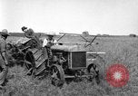 Image of Fordson tractor operating in a field United States USA, 1919, second 40 stock footage video 65675070234