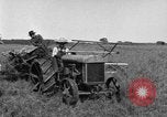 Image of Fordson tractor operating in a field United States USA, 1919, second 41 stock footage video 65675070234