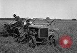 Image of Fordson tractor operating in a field United States USA, 1919, second 42 stock footage video 65675070234