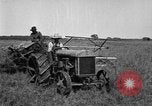 Image of Fordson tractor operating in a field United States USA, 1919, second 43 stock footage video 65675070234
