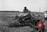 Image of Fordson tractor operating in a field United States USA, 1919, second 47 stock footage video 65675070234
