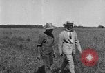Image of Fordson tractor operating in a field United States USA, 1919, second 51 stock footage video 65675070234