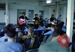 Image of Vietnamese rock band Vietnam, 1968, second 22 stock footage video 65675070269