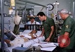 Image of injured man Vietnam, 1968, second 5 stock footage video 65675070270