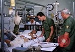 Image of injured man Vietnam, 1968, second 6 stock footage video 65675070270