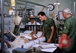 Image of injured man Vietnam, 1968, second 7 stock footage video 65675070270