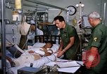Image of injured man Vietnam, 1968, second 10 stock footage video 65675070270