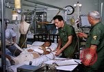 Image of injured man Vietnam, 1968, second 12 stock footage video 65675070270