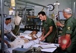 Image of injured man Vietnam, 1968, second 16 stock footage video 65675070270