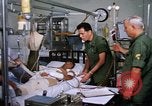 Image of injured man Vietnam, 1968, second 18 stock footage video 65675070270