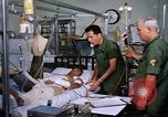 Image of injured man Vietnam, 1968, second 19 stock footage video 65675070270